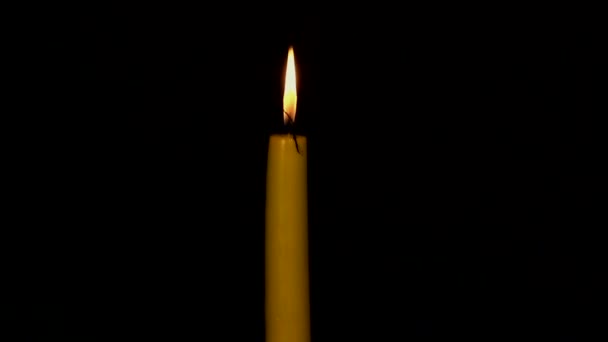 Burning-down yellow candle. Time lapse - Footage, Video