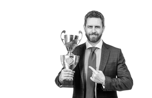 mature businessman in suit pointing finger on golden cup. business success. successful man boss got prize. best entrepreneur of year. trophy and prestige. director celebrate victory. achievement. - Photo, Image