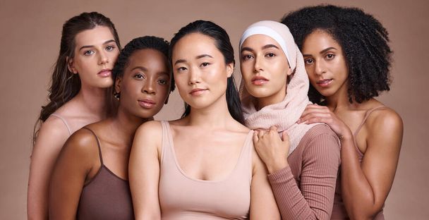 Portrait, beauty and diversity with a model woman group in studio on a brown background for inclusion. Face, natural and different with a female and friends posing to promote health or equality. - Photo, Image