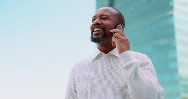 Phone call, business man and talking in city, chatting or speaking. Tech, cellphone and happy black man on 5g mobile smartphone for business deal discussion, networking or conversation with contact - Filmagem, Vídeo
