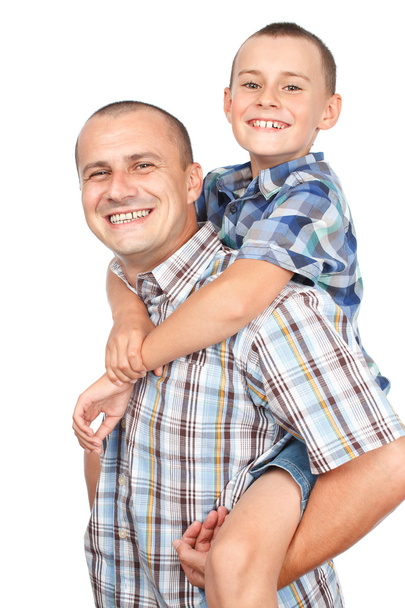 Father and son piggyback - Фото, зображення