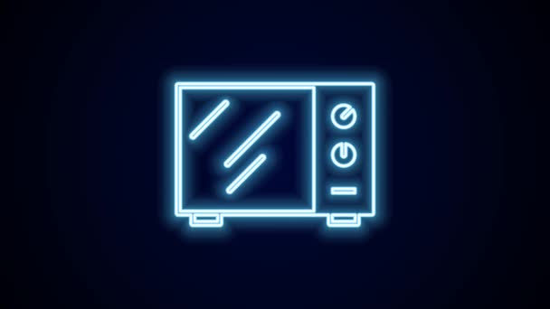 Leuchtende Neon-Linie Mikrowellenherd-Symbol isoliert auf schwarzem Hintergrund. Hausgeräte-Symbol. 4K Video Motion Grafik Animation. - Filmmaterial, Video