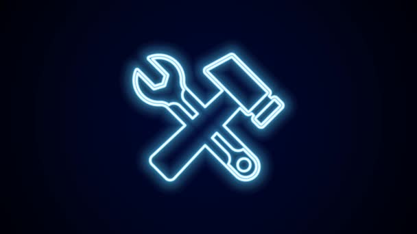 Glowing neon line Crossed hammer and wrench spanner icon isolated on black background. Hardware tools. 4K Video motion graphic animation. - Footage, Video