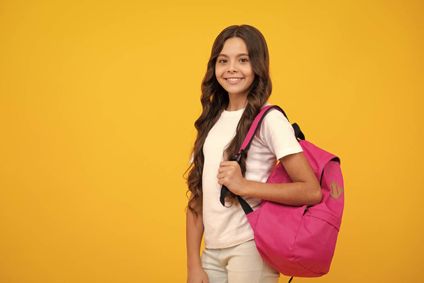 School teen with backpack. Teenager student, isolated background. Learning and knowledge. Go study. Education concept - Fotoğraf, Görsel