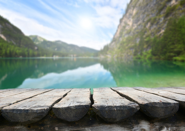 Empty table in the mountain lake - Photo, Image