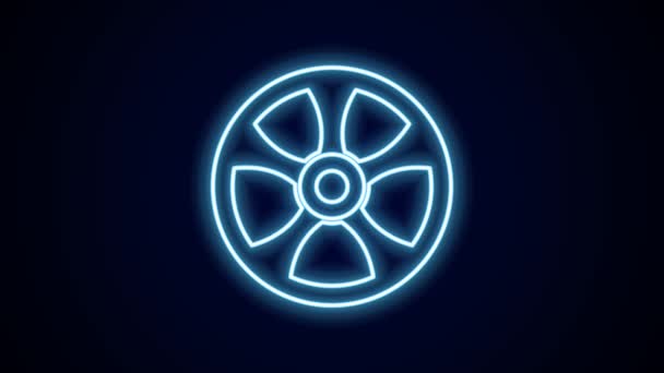 Glowing neon line Alloy wheel for car icon isolated on black background. 4K Video motion graphic animation. - Video
