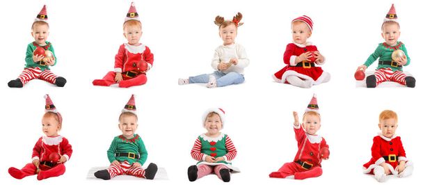 Grupo de bebés lindos en trajes de Navidad sobre fondo blanco - Foto, imagen