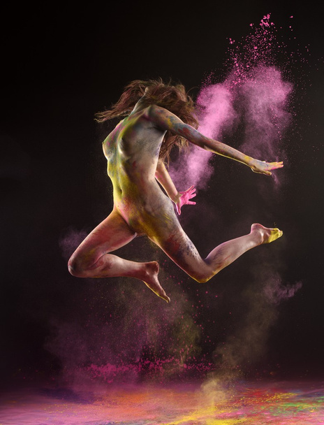 Bare Woman In Dramatic Jump Pose - Фото, зображення