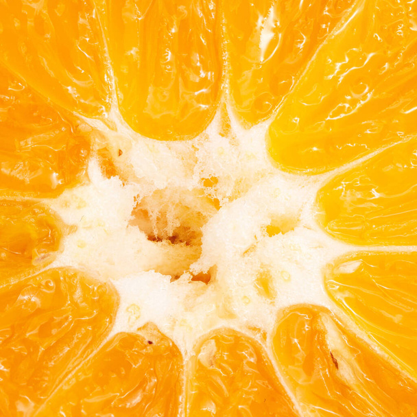 Pomarańczowa tekstura jako tło. Blisko pomarańczy. Makro zdjęcie. Pomarańcza. Zbliżenie - Zdjęcie, obraz