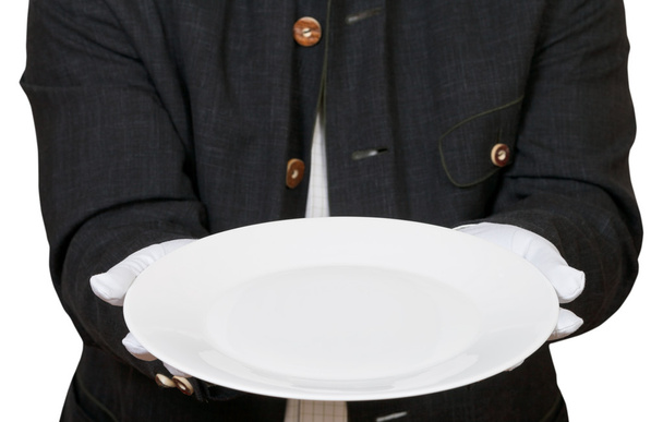 above view of empty white plate in hands in gloves - Photo, Image