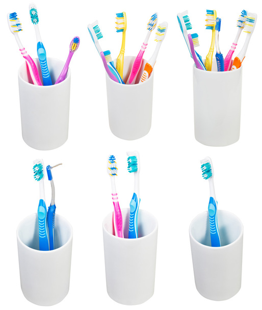συλλογή της οδοντόβουρτσες σε κεραμικά τζάμια - Φωτογραφία, εικόνα