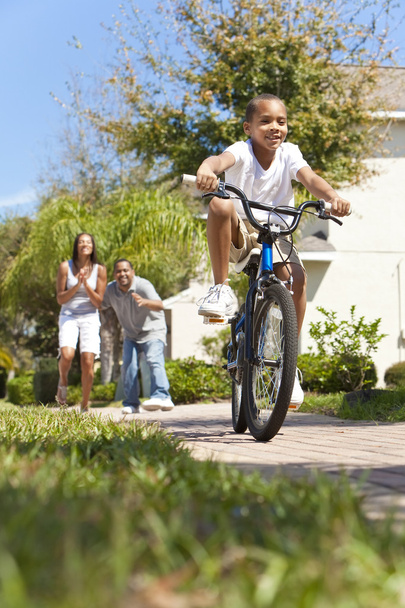 African American Family WIth Boy Riding Bike & Happy Parents - Foto, Imagen