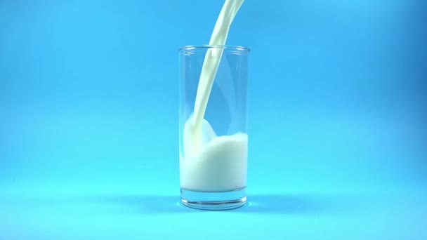 Glass of Milk with Pouring Splash - Video, Çekim