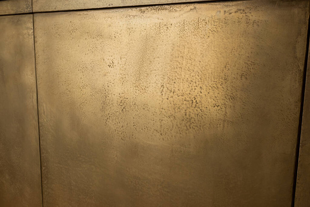 close up of golden wall at reception in luxury hotel  - Foto, Bild