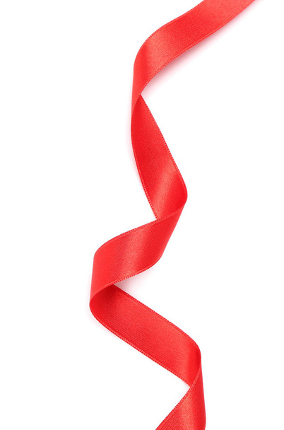Червона атласна стрічка ізольована на білому тлі
 - Фото, зображення