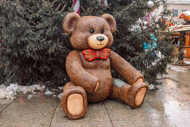 Big teddy bear toy at the Christmas market in Katowice, Poland. Retail store at Christmas in Katowice, Poland. - Photo, Image