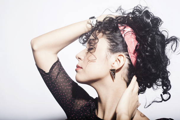 Model brunette with long curly hair. sensual brunette woman with shiny curly silky hair studio shot. - 写真・画像