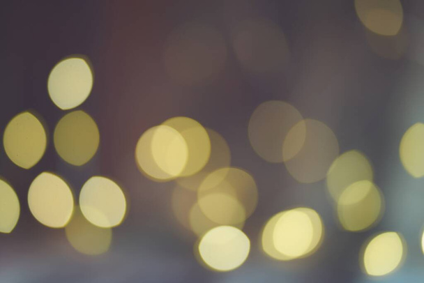 Christmas light background. Holiday glowing backdrop. Defocused Background With Blinking light. Blurred Bokeh. High quality photo - Photo, Image