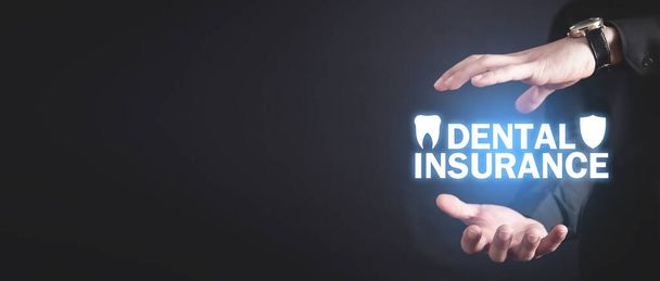 Dent avec protection de bouclier. Assurance dentaire
 - Photo, image