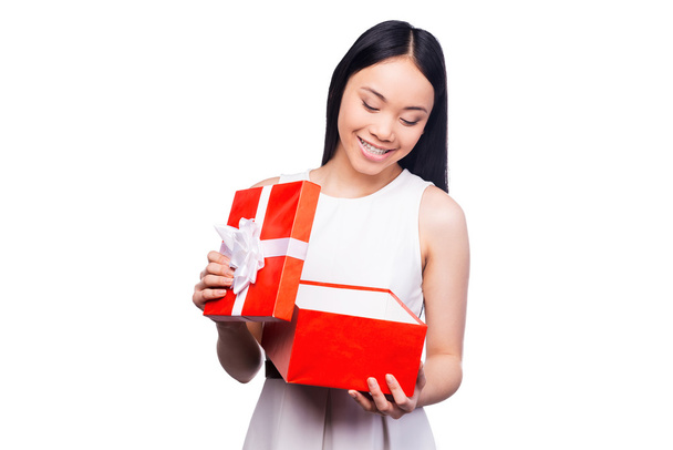 Asian woman opening gift box - Photo, Image