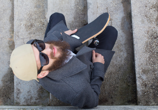 Guy with skateboard - Photo, Image