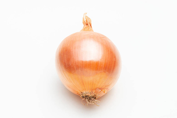Fresh onion isolated on white. vegetable and food. Obesity and diet concept. - Photo, Image