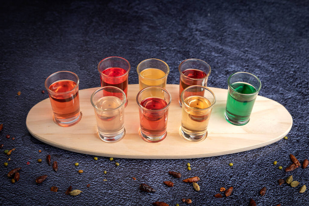 Different glasses of shooter alchool for aperitive or festive situation - Photo, Image