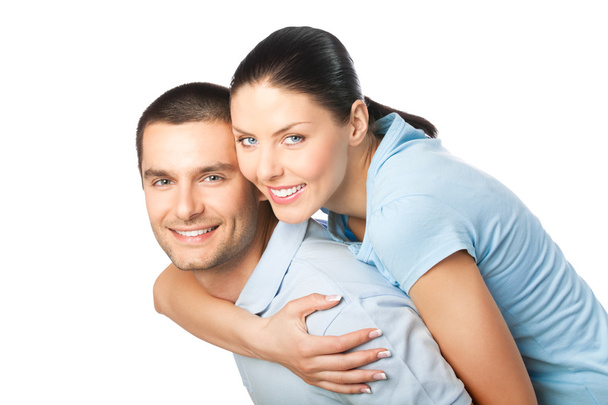 Portrait of young happy smiling attractive couple, isolated on w - Фото, изображение