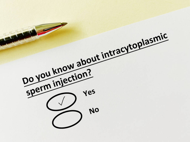 A person is answering question about infertility. He knows about intracytoplasmic sperm injection. - Photo, Image