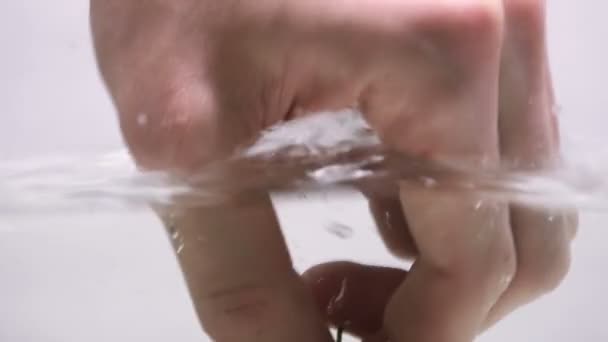 Hand Washing Tomato in Water - Filmmaterial, Video