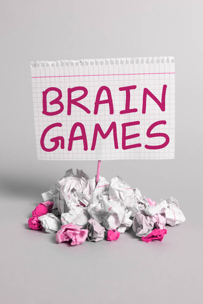 Sinal de texto mostrando Jogos Cerebrais, Palavra para tática psicológica para manipular ou intimidar com o adversário - Foto, Imagem