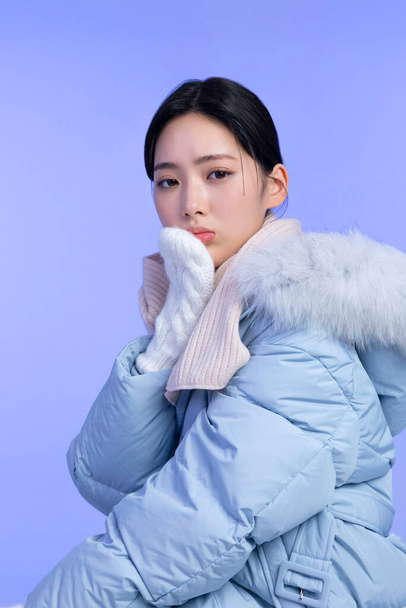beautiful young Korean Asian woman portrait studio photo in winter skin beauty and cosmetics concept__cold - Photo, Image