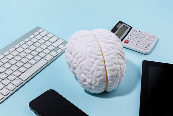 brain health and dementia series, a brain miniature and digital device - Фото, изображение