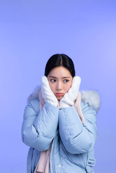 beautiful young Korean Asian woman portrait studio photo in winter skin beauty and cosmetics concept__cold - Fotografie, Obrázek