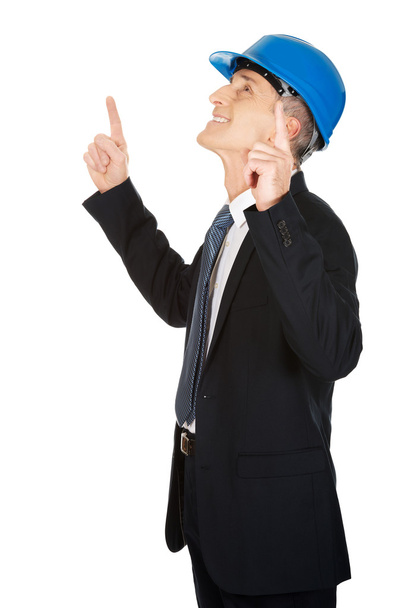 Businessman engineer pointing up - 写真・画像