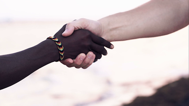 Hand shake as symbol of international friendship - Footage, Video