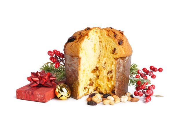 Cut Panettone with Christmas decor and gift on white background - Photo, Image