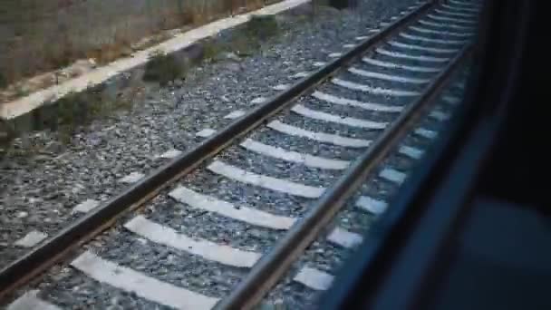Vista del ferrocarril desde la ventana del tren. - Imágenes, Vídeo