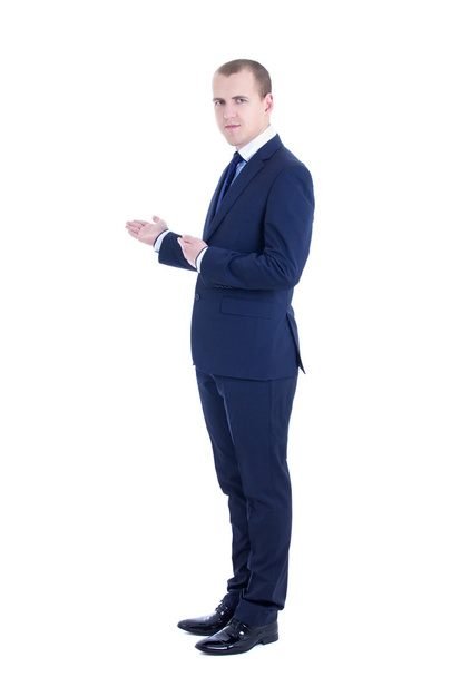 красивый бизнесмен, представляющий copyspace, изолированный на белом - Фото, изображение