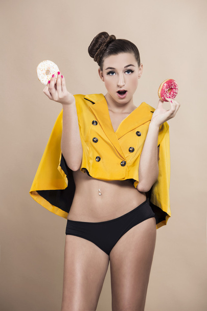Fashion woman with donuts - Fotó, kép