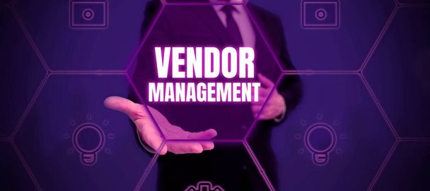 Text sign showing Vendor Management, Word Written on activities included in researching and sourcing vendors - Photo, Image