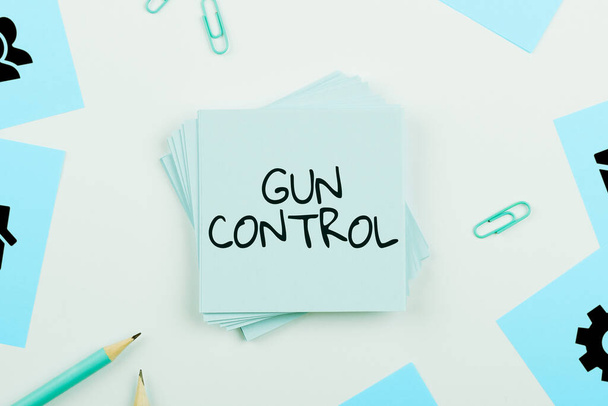 Conceptuele bijschrift Gun Control, Business concept juridische maatregel bedoeld om het bezit van wapens te beperken - Foto, afbeelding