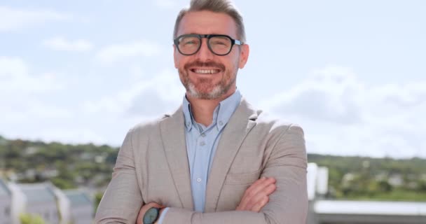 Businessman face with smile, ceo and company executive headshot with vision, success and positive mindset outdoor. Professional portrait, eye glasses and leadership with corporate employer California. - Footage, Video
