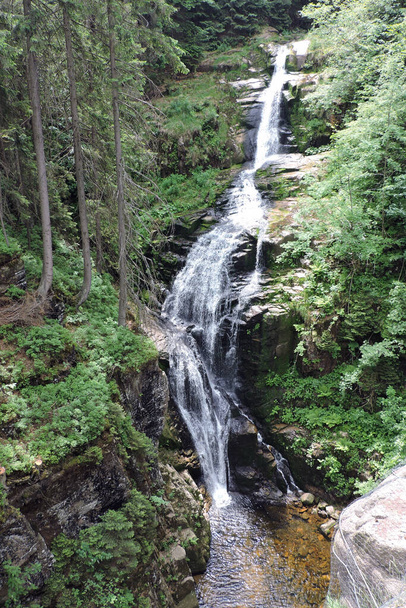 Kamieczyk Waterfall, the highest waterfall in the Polish part of The Karkonosze Mountains falling from a rocky wall to the Kamieczyk Gorge - Photo, Image