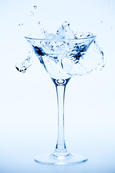 Martini splash on blue - 写真・画像