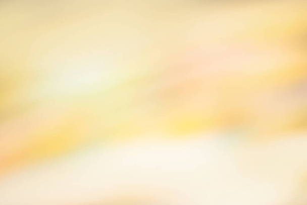 Abstrakte verschwommene elegante Soft Naturelle beige Bokeh Hintergrund. Beige abstrakte Unschärfe glühende Pastelltöne Farbe Textur - Foto, Bild