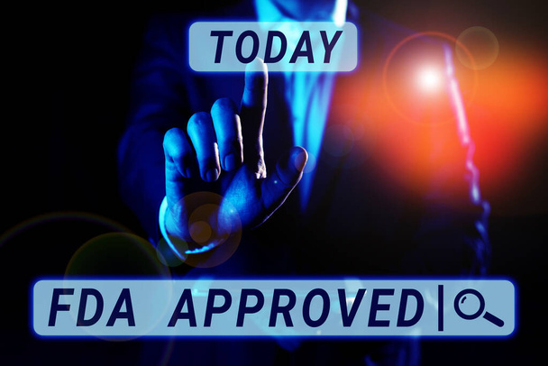 Scrittura visualizzazione del testo Approvato da Fda, Concetto che significa FDA ha accettato il prodotto o la formula è sicuro ed efficace - Foto, immagini