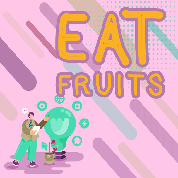 Escribir mostrando texto Comer frutas, Idea de negocio consumir cualquier producto de crecimiento vegetal útil para los seres humanos o los animales - Foto, Imagen