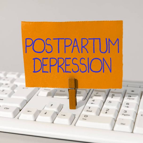 Hand writing sign Postpartum Depression, Business concept a mood disorder involving intense depression after giving birth - Photo, Image