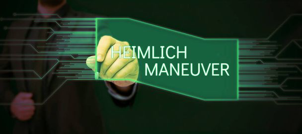 Kavramsal ekran Heimlich Manevrası, boğulma durumunda yukarı doğru baskı uygulaması - Fotoğraf, Görsel